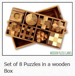 Set of 8 Puzzles in a wooden Box